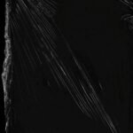 Abstract plastic wrap texture with dramatic lighting on a black surface.