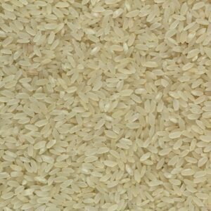 Detailed close-up of raw white rice grains, showing their texture and natural color.